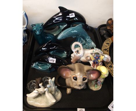 A Poole pottery dolphins, cat and salmon and other animal figures Condition Report: Available upon request