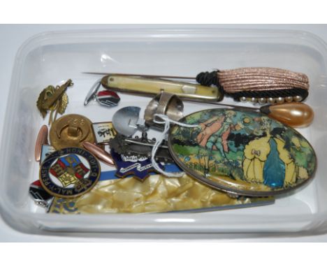 A box of miscellaneous including enamel badges, hat pin, compact etc Condition Report: Available upon request