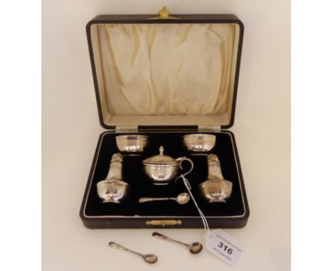 A cased five piece silver condiment set, probably by John Charles Lowe, Birmingham 1938 with a band of engine turned decorati