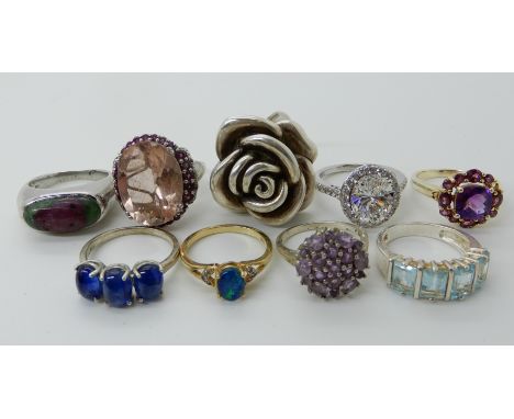 A collection of silver and white metal rings to include, kyanite, opal triplet, amethyst etc Condition Report: Not available 