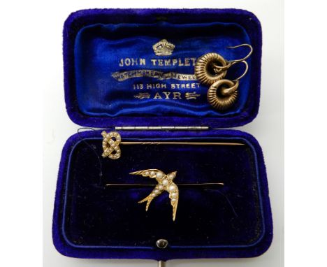 A bright yellow metal pearl set swallow brooch, a bright yellow metal pearl set lovers knot pin and a pair of yellow metal vi