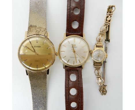 A 9ct gold cased gents Tissot Seastar seven, inscribed verso, diameter 3.4cm, a gold plated gents Sekonda and a ladies gold p