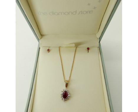 A 9ct gold ruby and diamond pendant and chain with matching earrings, length of pendant 1.7cm, chain 46cm, weight 2.6gms Cond