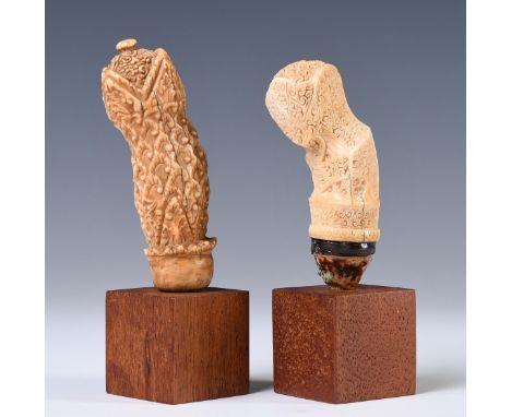 Northeast-Sumatra, Karimun Islands, two rare kris hilts, the first item made of sperm whale ivory showing a anthropomorphic j