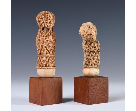 East-Java, Madura, two ancestor figure kris hilts, one marine ivory item with a  screwable selut, the other made of deer horn