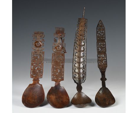 West-Timor, four horn spoons; all with open worked rectangular panels, showing birds, two topped by a comb design.  L. 24 - 2