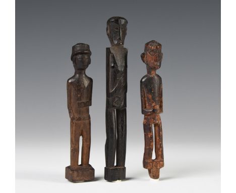 Borneo, East Kalimantan, Luangan Dayak, three various amulet figures, the first item showing a standin male figure, is hands 