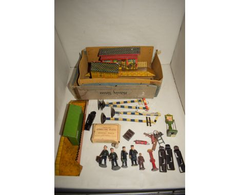 Hornby Meccano tinplate platform and station; signals; lead figures of ticket men; luggage; and other items.