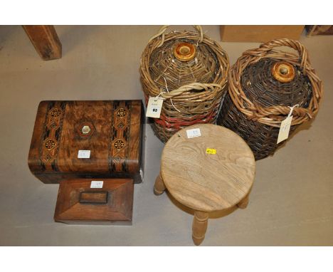 A pair of stoneware flagons, in wicker cases; Tunbridge ware walnut box and cover; a 19th Century rosewood tea caddy; and an 