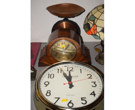 A Towcester Clockworks Company battery powered wall clock; an Art Deco Mantle Clock in oak case; and a Salter Family scale no