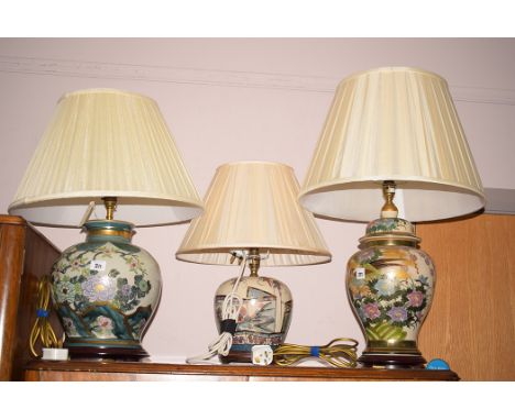 Three large modern Oriental style ceramic table lamps and shades.