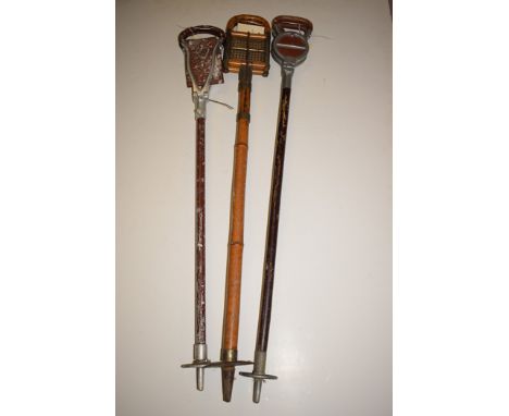 A Swaine Brigg shooting stick; another by Sialkot; and another made from bamboo.  (3)