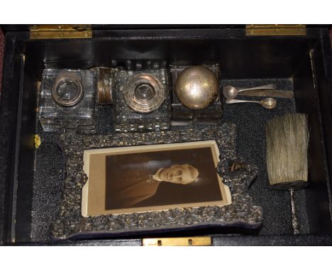 Three cut glass inkwells, one by Army & Navy Co-operative Society  Ltd; a miniature silver teaspoon; a white metal picture fr