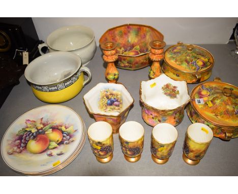 Assorted ceramics, to include; tureens; candlesticks; cups; and plates in fruit pattern with gold detailing; together with tw