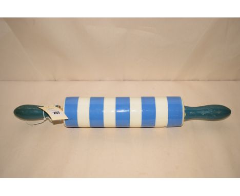 A T.G. Green Cornish ware blue and white striped ceramic rolling pin.