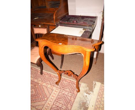 A Victorian walnut occasional table converted to a console table.