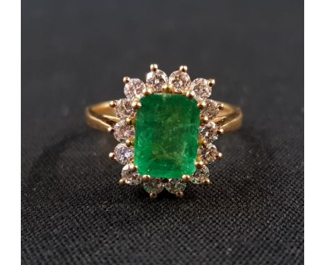 18 CARAT YELLOW GOLD EMERALD &amp; DIAMOND RING WITH HALF CARAT OF DIAMONDS &amp; 2 CARAT EMERALD