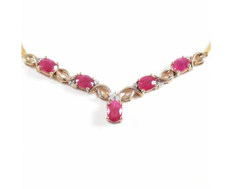 A hallmarked 9ct gold ruby and diamond pendant necklace. Total weight 4.6g. Measures 45cm.&nbsp;All weights, measurements and