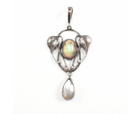 An Arts and Crafts silver opal and mother of pearl necklace pendant.&nbsp; The pendant having a mother of pearl pendant drop 