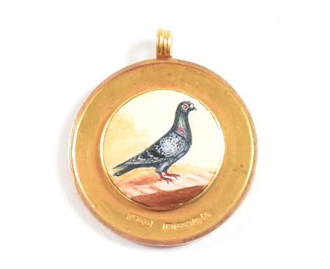 A hallmarked 15ct gold enamel pigeon medal pendant. Hallmarked Birmingham. WHH for William Hair Haseler. Inscribed Grays &amp