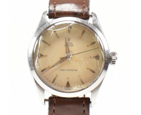 A Mid century Tudor Oyster wristwatch. Stainless steel case with champagne dial, baton and diamond shaped numerals. Marked Tu