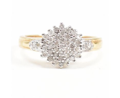 A hallmarked 18ct gold and diamond cluster ring. Estimated diamond weight 0.50ct. Weight 3.6g. Size M.&nbsp;All weights, meas