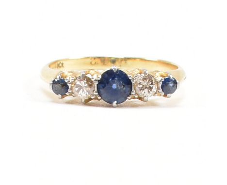 An 18ct gold sapphire and diamond five stone ring. Estimated diamond weight 0.20ct. Weight 2.6g. Size K.5.&nbsp;All weights, 