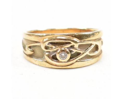 Clogau hallmarked 9ct gold ring. The ring set with a single round brilliant cut diamond within Celtic knot design set to tape