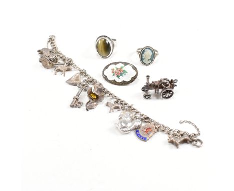 A collection of silver and white metal jewellery. The jewellery to include a hallmarked silver tigers eye ring. A silver jasp