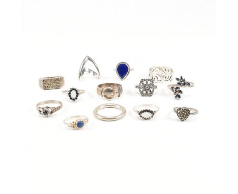 A collection of 925 silver and gem set rings.The rings to include sapphire, lapis lazuli, marcasite, opal, band, crossover, s