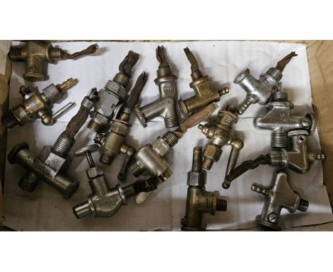 15 various vintage petrol taps 