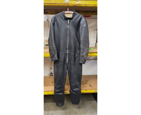 A vintage set of one piece black leathers, cotton lined, size L/XL 
