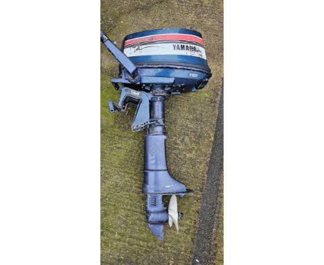 A Yamaha 4hp four stroke outboard engine. 