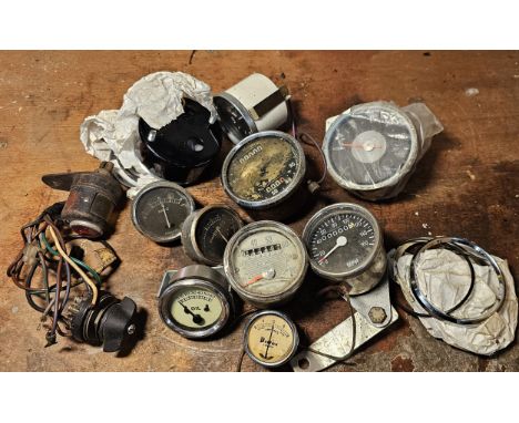 A vintage rear lamps with lens, a Smiths Speedo and other gauges 