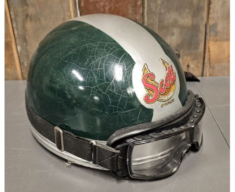 A vintage Cromwell cork helmet, size 7 together with a pair of Aviator goggles by Leon Jeantet. 