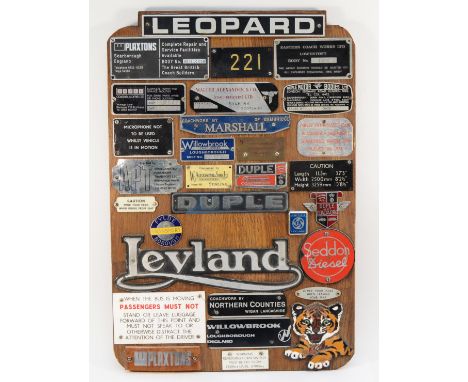 A collection of vintage bus related badges 