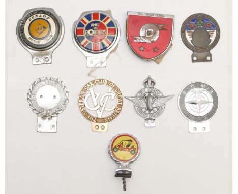 A Royal Aero Club chrome and enamel badge, lacking enamel pennant, no. 327, a brass and enamel badge, lacking motif and seven
