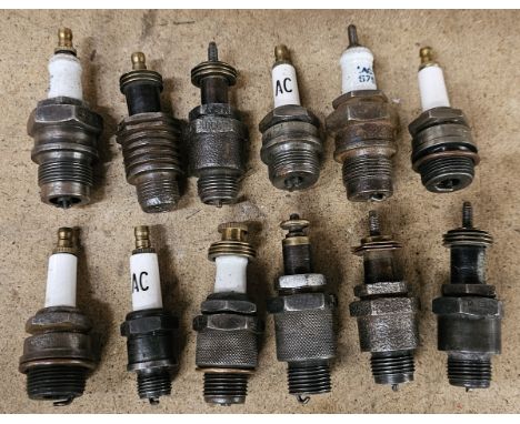 12 Various vintage spark plugs 