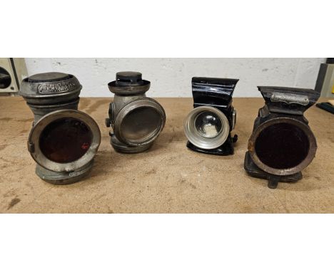 Four vintage bicycle lamps, The Minolite, Toura No 324 and two by Miller 