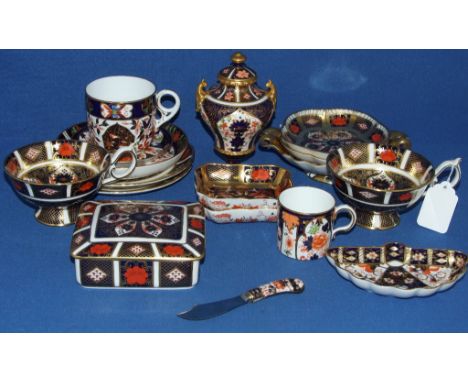 A pair of Royal Crown Derby Imari cups and saucers, 1128, three matching plates, 26.5 cm wide, other plates, cups and saucers