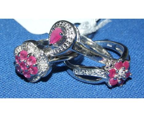 Three silver, ruby and diamond dress rings