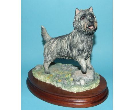 A Border Fine Arts limited edition figure, Silver Brindle Cairn Terrier, with certificate, eight Hummel figures, a Royal Crow