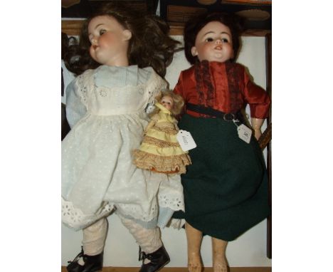 An Armand Marseille bisque head doll, with sleeping brown eyes and open mouth exposing four teeth, incised Armand Marseille/G