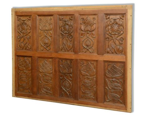A pair of Arts & Crafts oak panels, carved flowers and foliage, 167 x 135 and 168 x 137 cm, and another matching section, 144