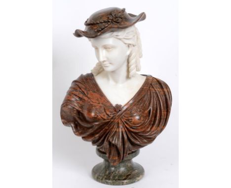 A carved marble bust, of a lady wearing a hat, on a socle base, 60 cm high  See illustration