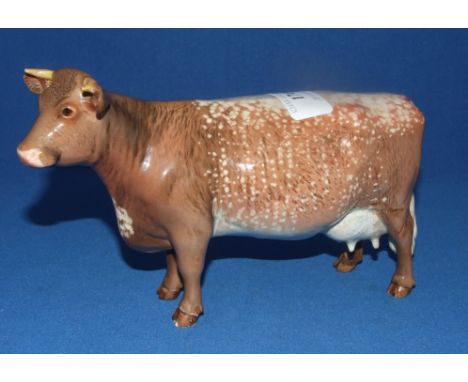 A Beswick Dairy Shorthorn Cow, 1510, gloss (hoof chipped) Condition report Report by NG

Light crazing.  No visible restorati