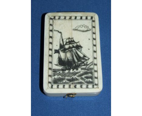 A pocket compass, in a case decorated a ship