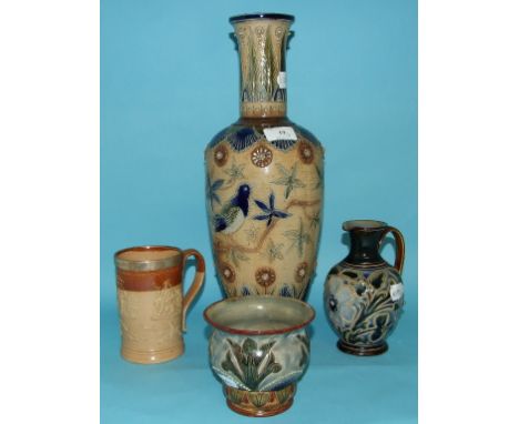 A Doulton Lambeth stoneware ewer, decorated flowers and foliage, the base incised with Frank Butler monogram, 244 and stamped