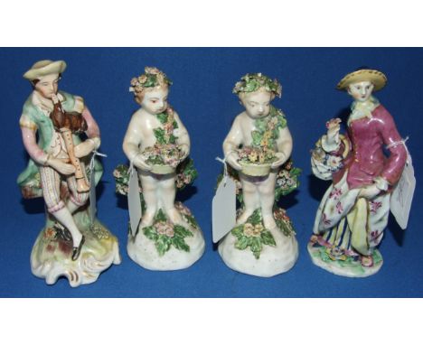 A pair of 19th century porcelain putti, 14.5 cm high, and two similar figures (a.f.) (4) Condition report Report by RB

The t