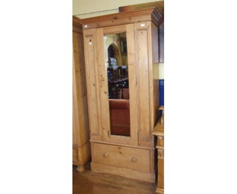 A stripped pine wardrobe, 92 cm wide, and a pine cupboard (2)